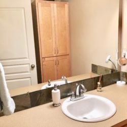 Full Bathroom upstairs with many amenities and shelves